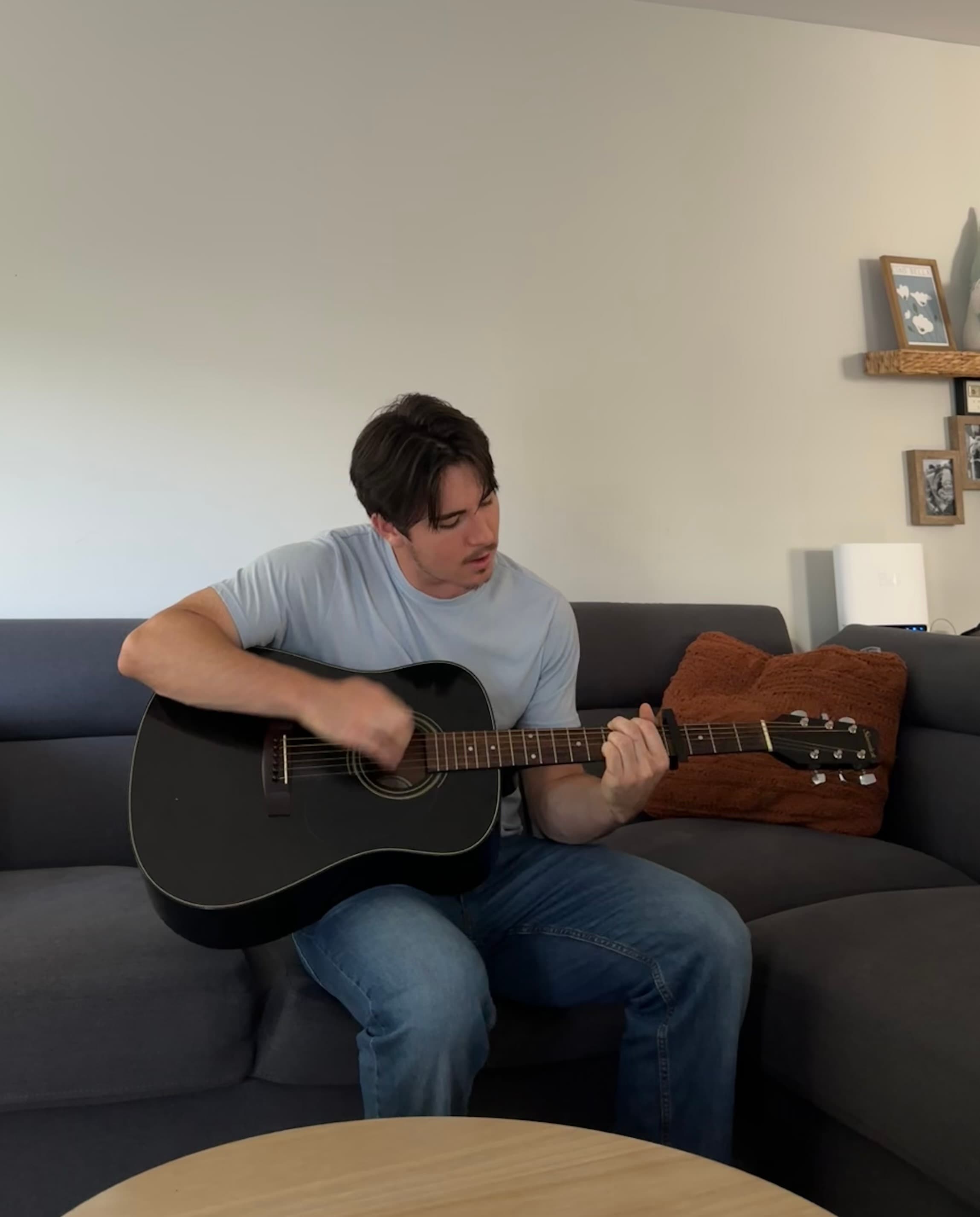 Zachary playing guitar